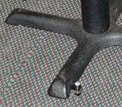 Iron cast base on carpeted floor